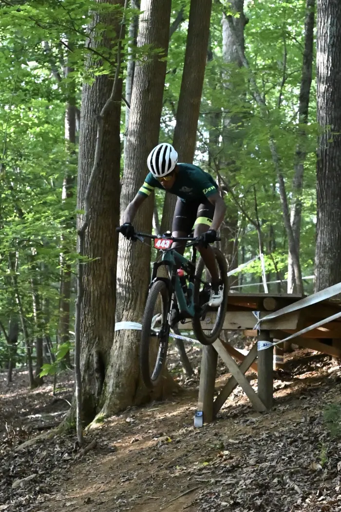 Rider coming off a wooden ramp
