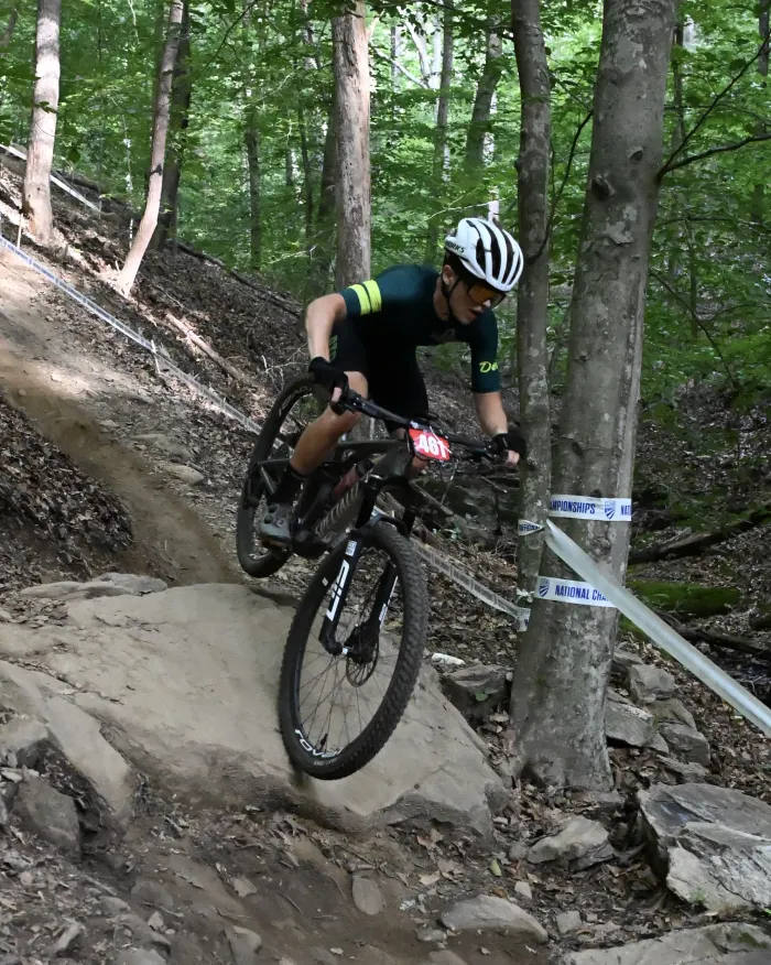 Rider picking a line through rocky terrain